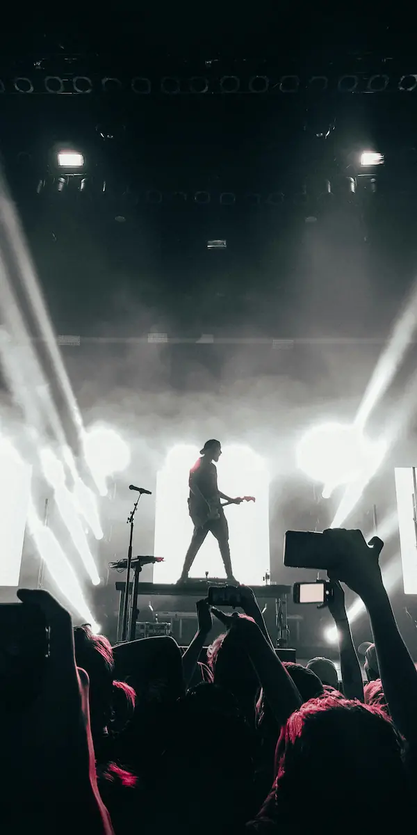 A guitarist performs on-stage