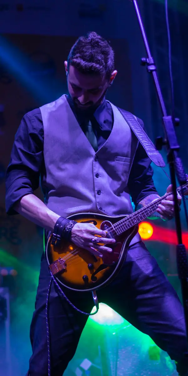 A guitarist performing live